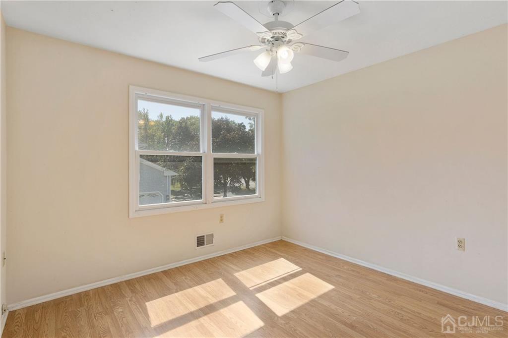 461 Cottrell Road Old Bridge, NJ 08857 - Photo 14 of 21 an empty room with a window