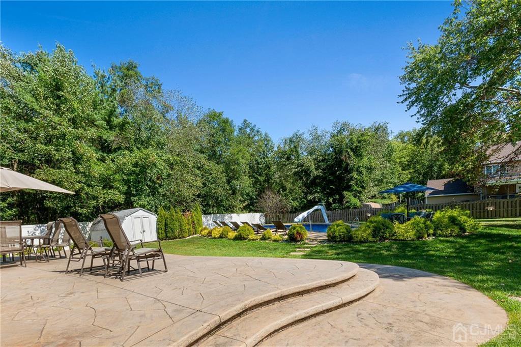 461 Cottrell Road Old Bridge, NJ 08857 - Photo 18 of 21 a view of a chair and table in the garden