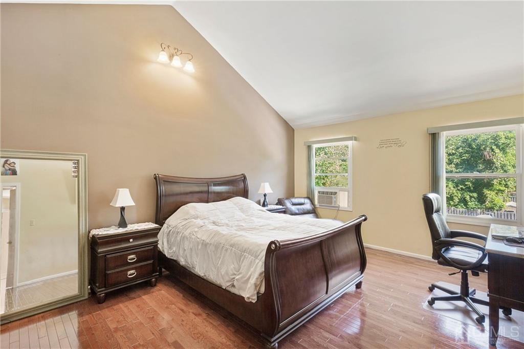 461 Cottrell Road Old Bridge, NJ 08857 - Photo 9 of 21 a bedroom with a bed a table and chair