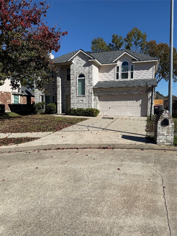front view of a house with a road