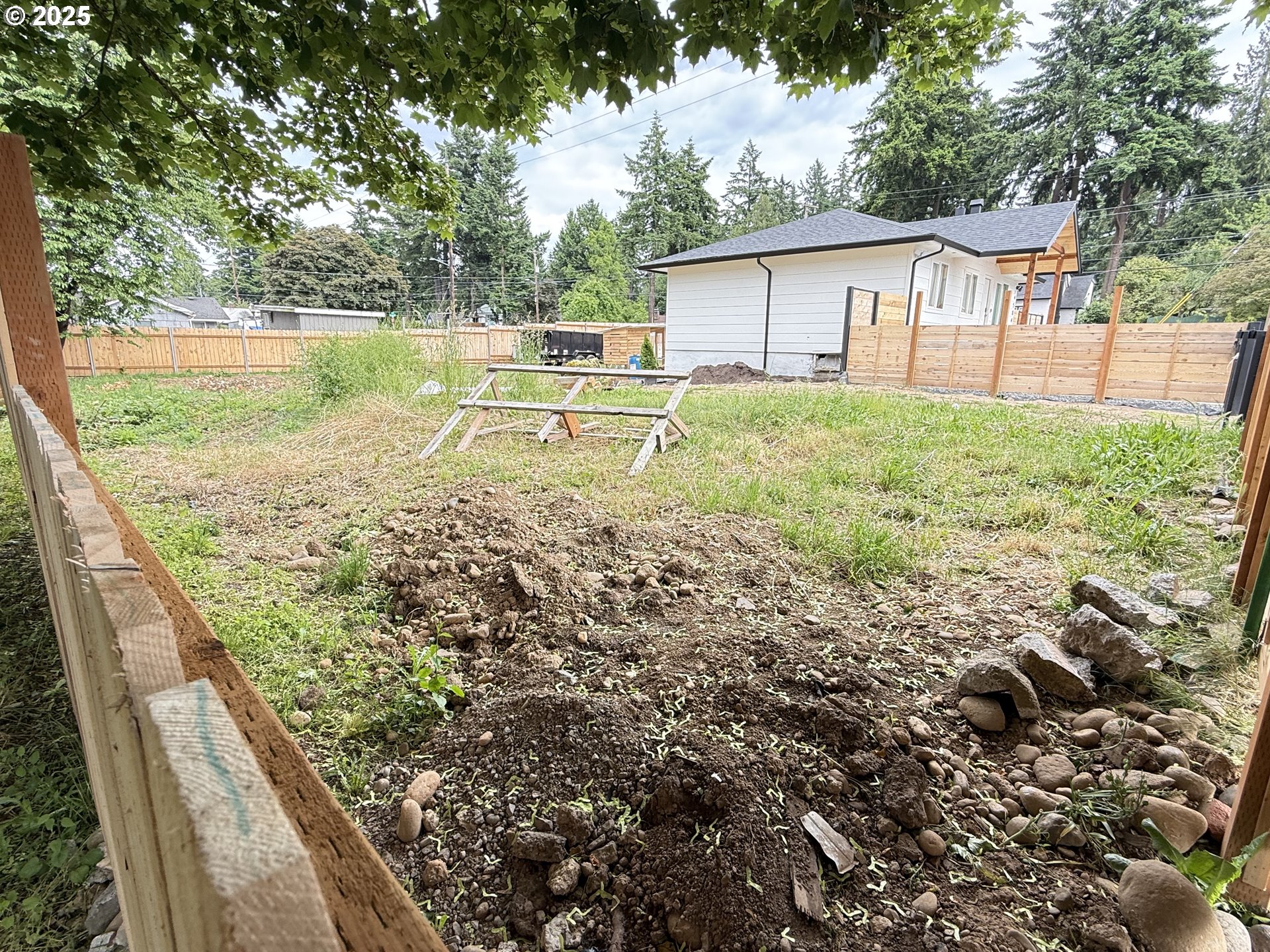 0 Northeast 95th Avenue Portland, OR 97220 - Photo 3 of 5 a backyard of a house with table and chairs