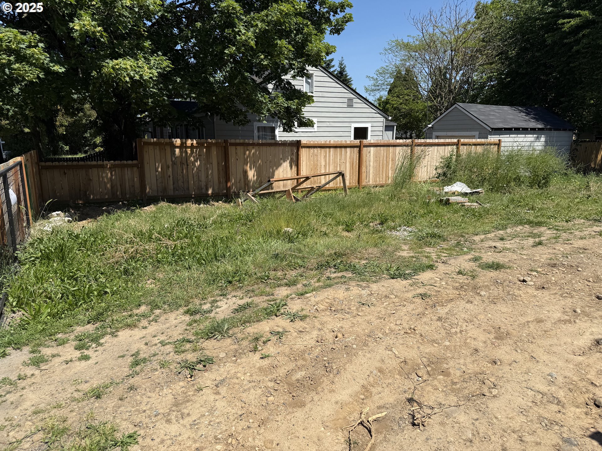 0 Northeast 95th Avenue Portland, OR 97220 - Photo 4 of 5 a backyard of a house with lots of green space
