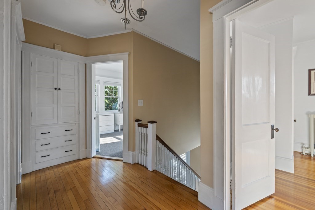 64 Farragut Road Swampscott, MA 01907 - Photo 19 of 35 a view of hallway with wooden floor