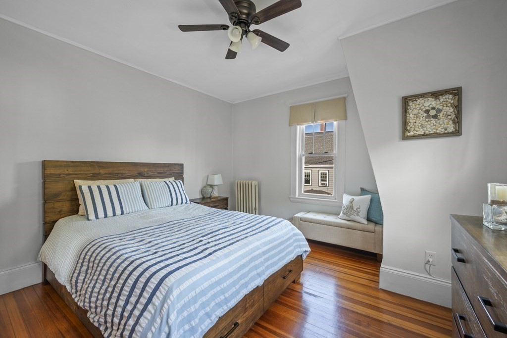 64 Farragut Road Swampscott, MA 01907 - Photo 20 of 35 a bedroom with a bed and a window