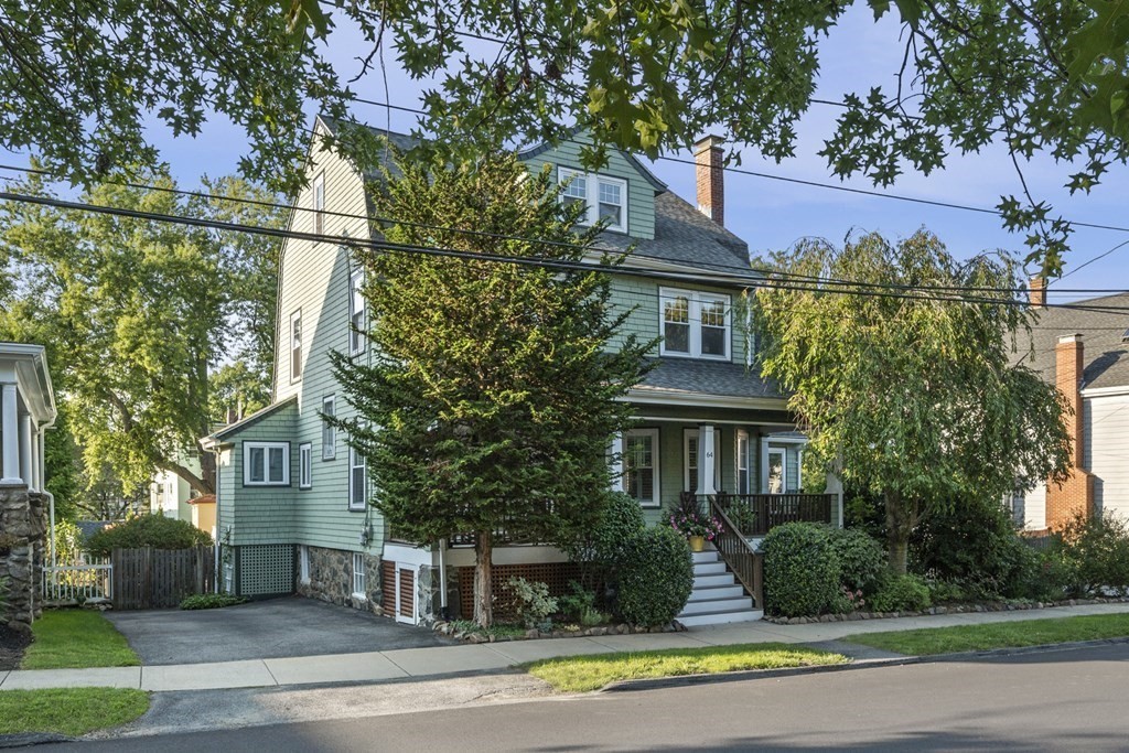 64 Farragut Road Swampscott, MA 01907 - Photo 2 of 35 front view of a house with a garden