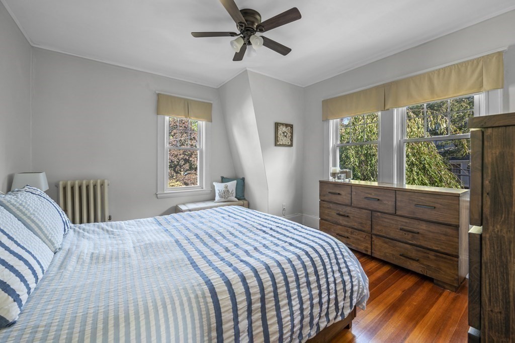 64 Farragut Road Swampscott, MA 01907 - Photo 21 of 35 a bedroom with a bed and a large window