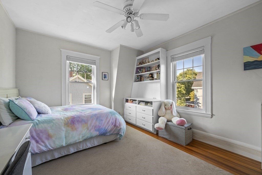 64 Farragut Road Swampscott, MA 01907 - Photo 22 of 35 a bedroom with a bed and window