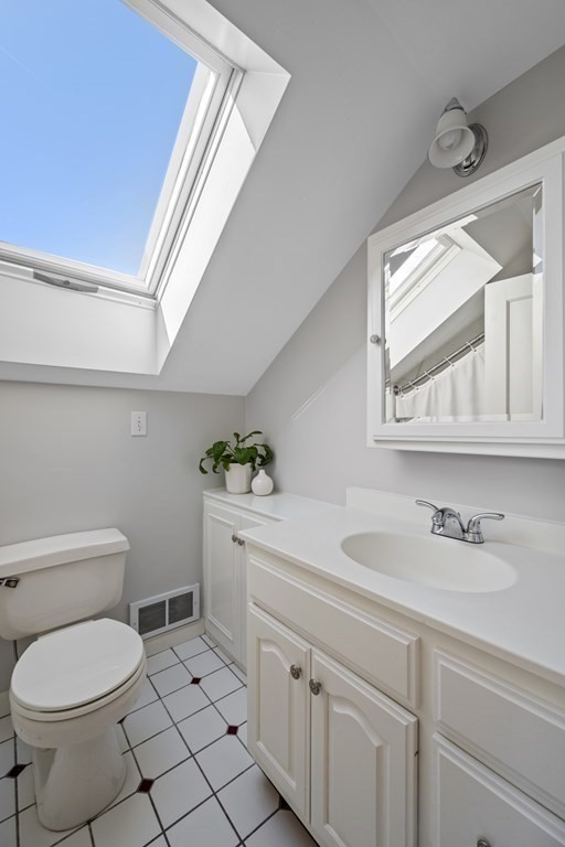 64 Farragut Road Swampscott, MA 01907 - Photo 30 of 35 a bathroom with a sink toilet and window