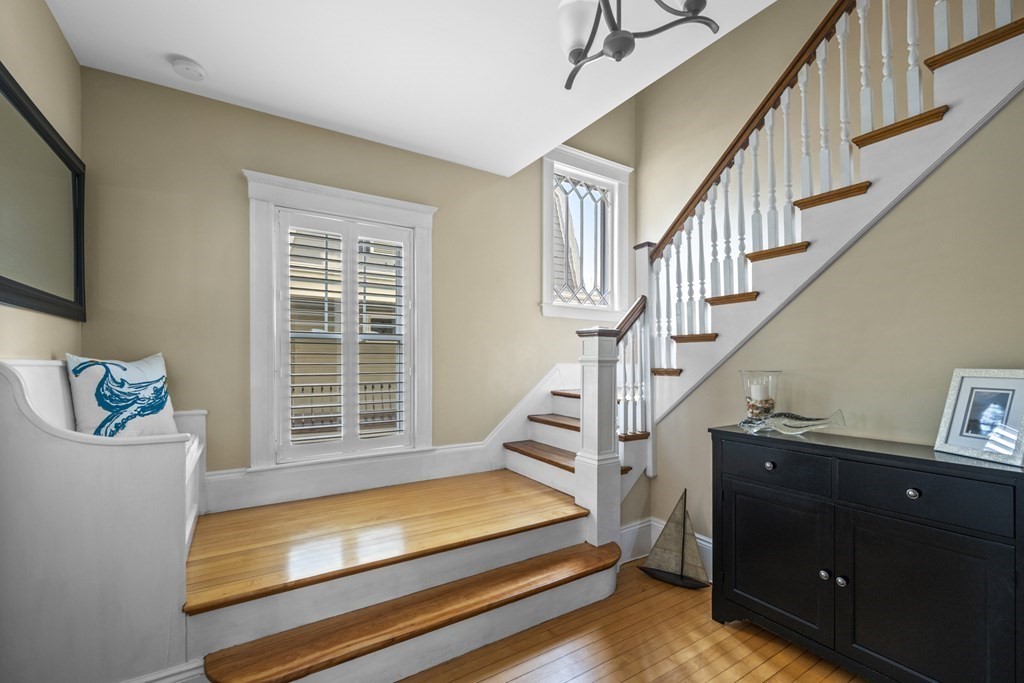 64 Farragut Road Swampscott, MA 01907 - Photo 3 of 35 a view of entryway with a window and a kitchen view