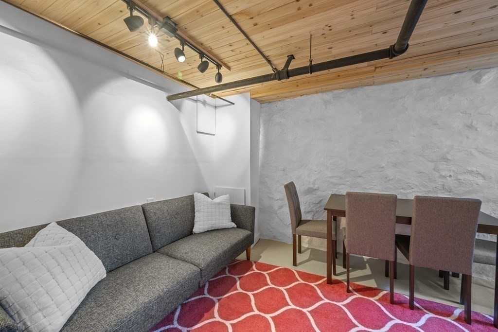 64 Farragut Road Swampscott, MA 01907 - Photo 32 of 35 a outdoor living space with furniture and a rug