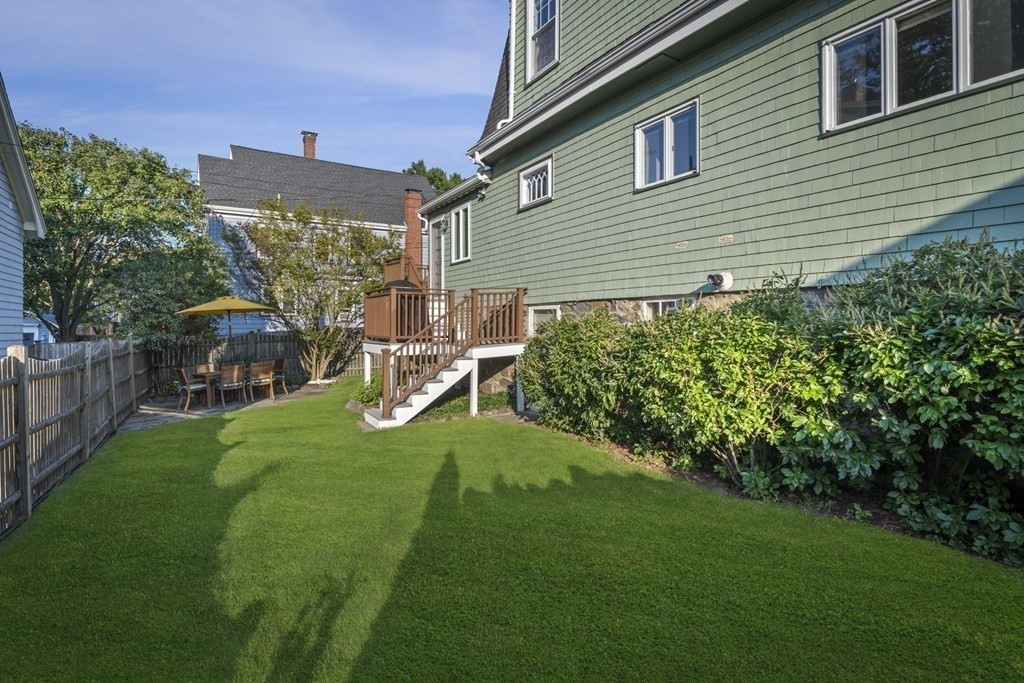 64 Farragut Road Swampscott, MA 01907 - Photo 33 of 35 a view of a backyard with plants and a garden