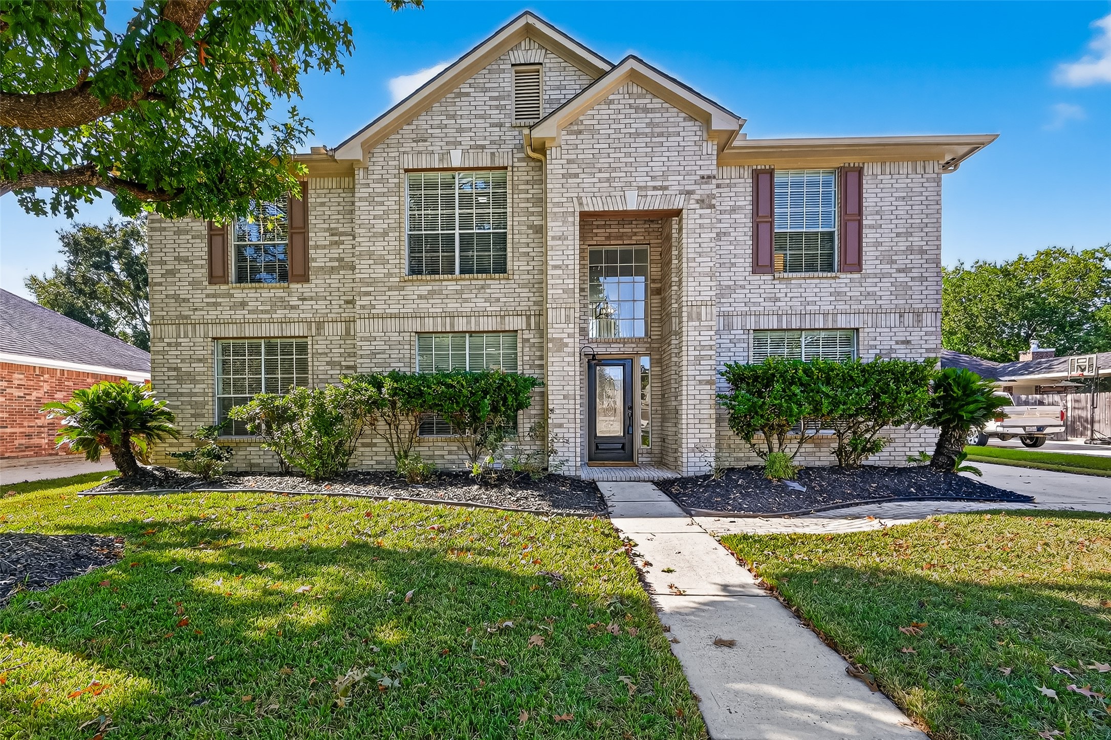 11727 Spring Path Court Tomball, TX 77377 - Photo 1 of 50 a front view of a house with a yard