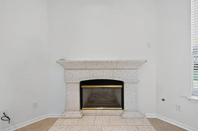 a hallway with a fireplace