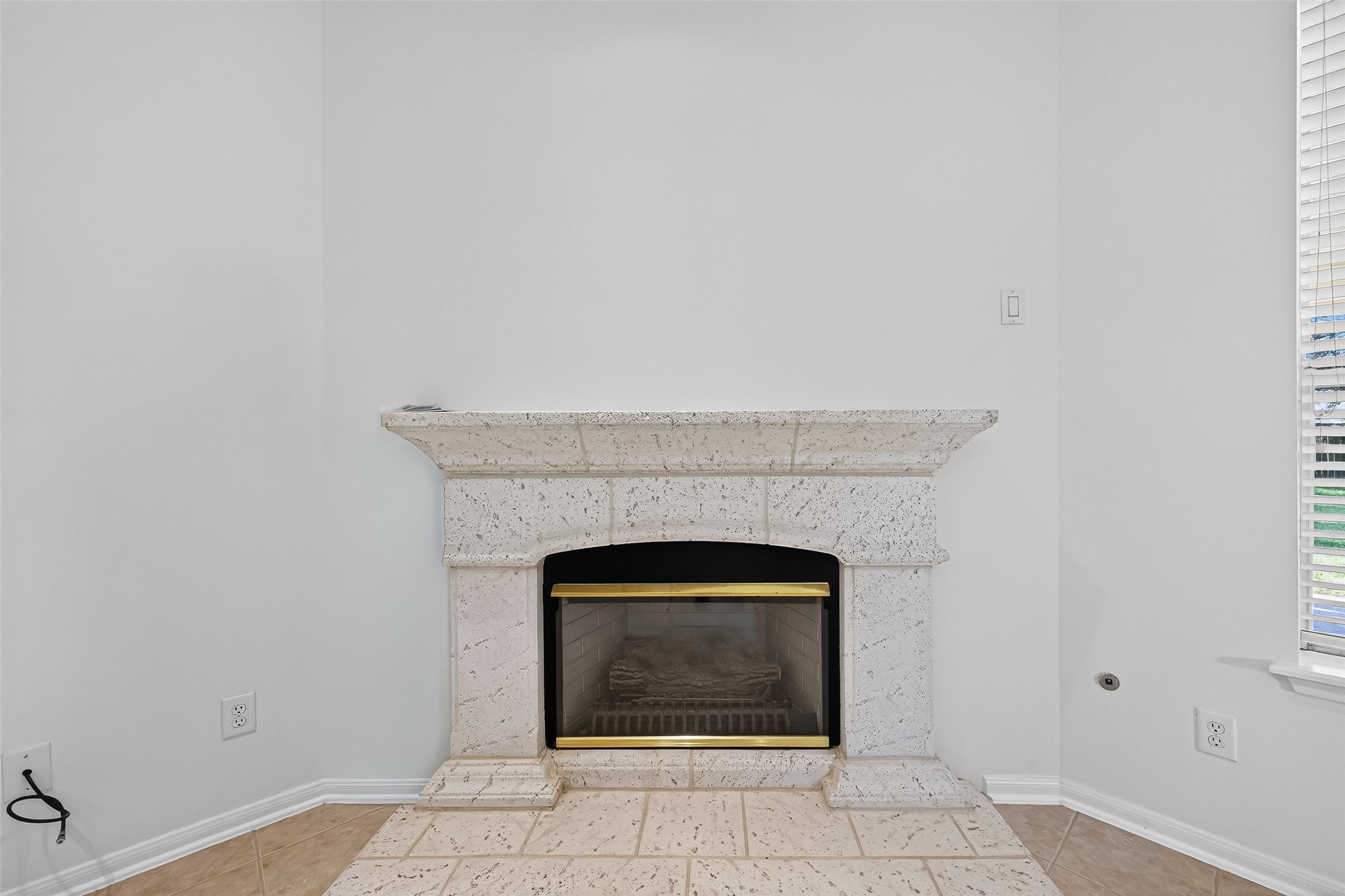 11727 Spring Path Court Tomball, TX 77377 - Photo 12 of 50 a hallway with a fireplace