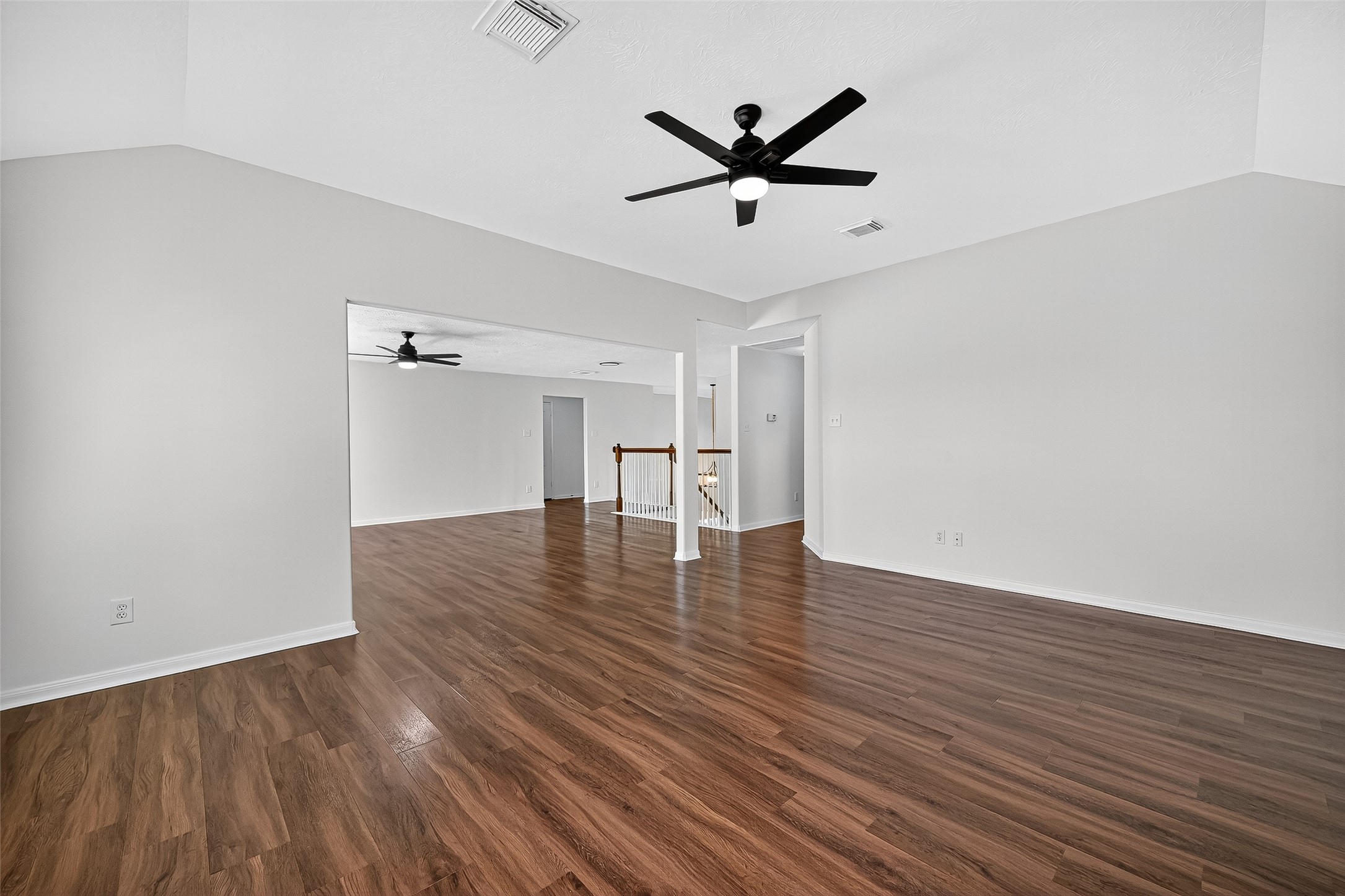 11727 Spring Path Court Tomball, TX 77377 - Photo 27 of 50 an empty room with wooden floor and windows