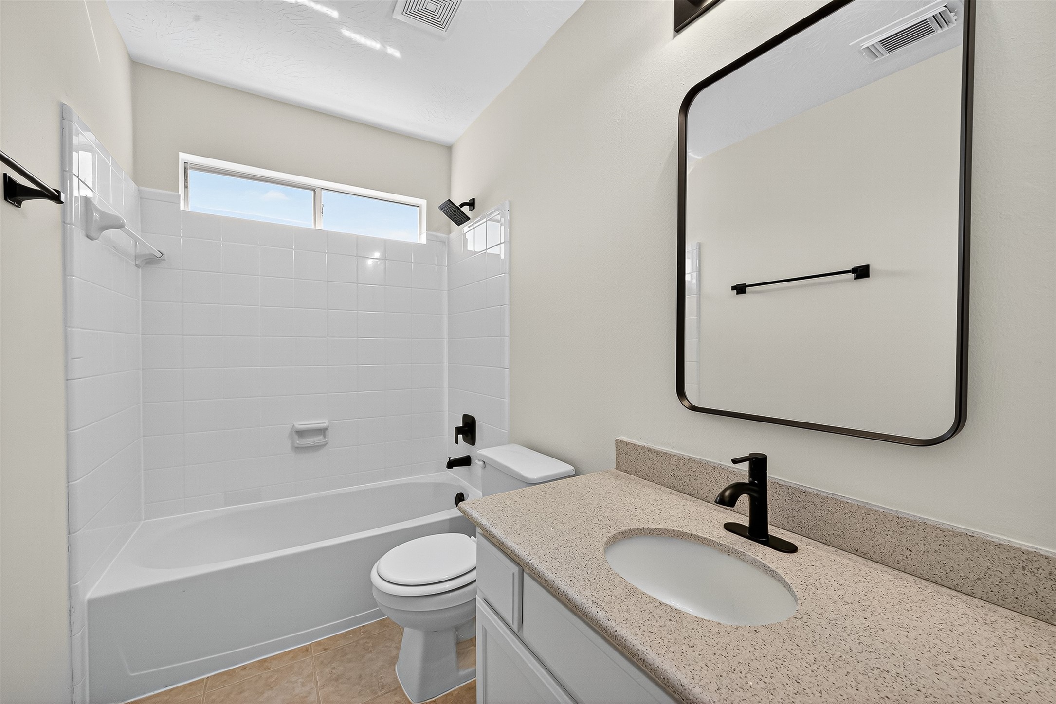 11727 Spring Path Court Tomball, TX 77377 - Photo 29 of 50 a bathroom with a granite countertop toilet sink and mirror