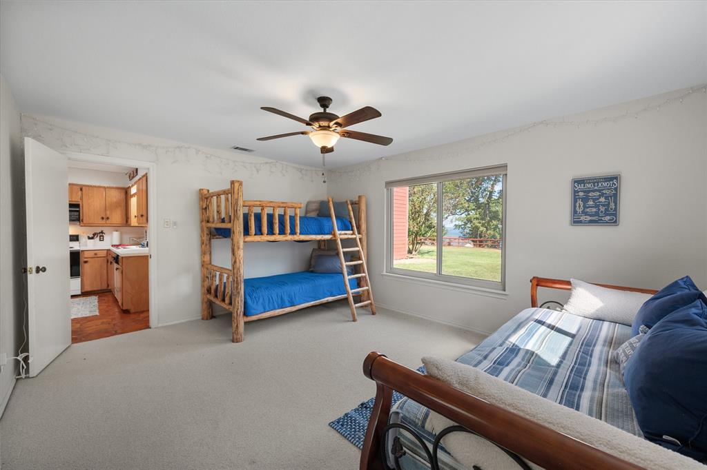 195 Highview Streetman, TX 75859 - Photo 21 of 40 a living room with furniture and window