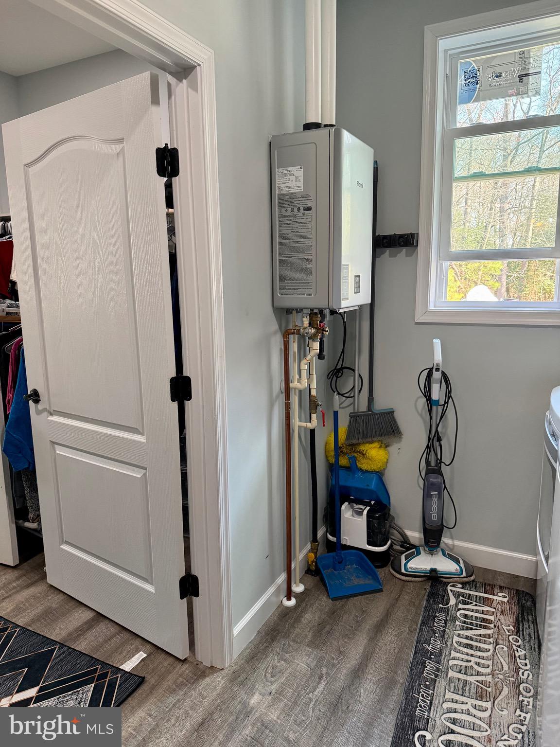 1108 Camp Road Denton, MD 21629 - Photo 21 of 28 Laundry Room with tankless hot water heater