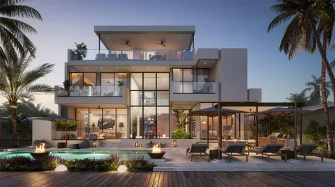 a front view of a building with outdoor seating