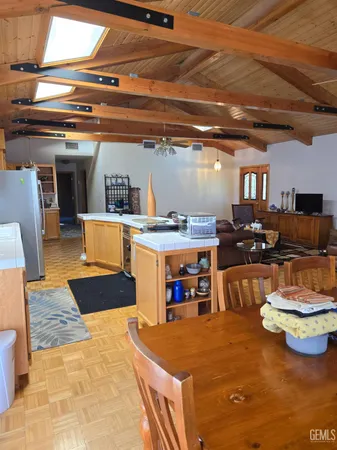 a kitchen with a stove and a refrigerator