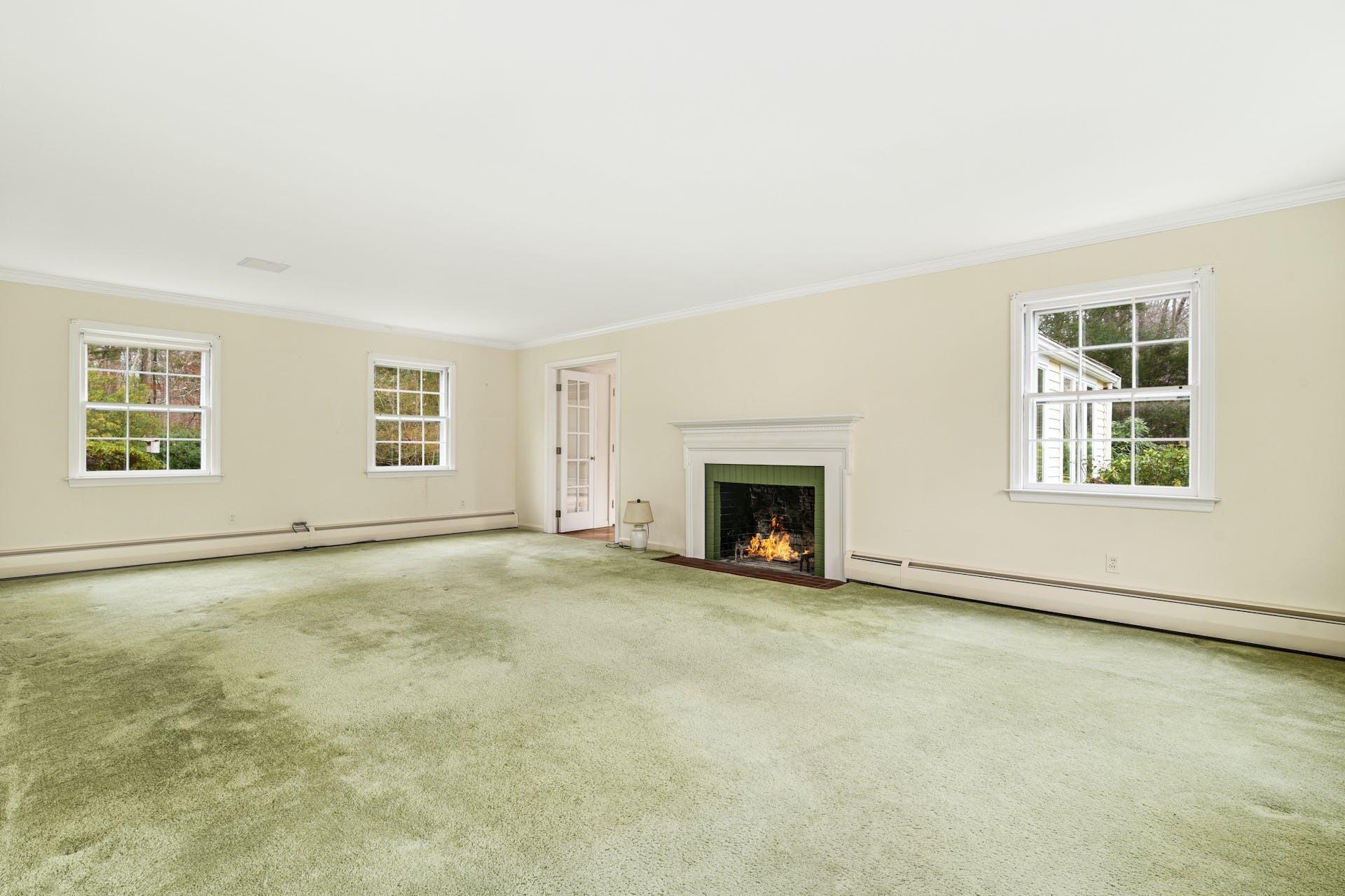 113 Logan Road New Canaan, CT 06840 - Photo 5 of 27 an empty room with windows