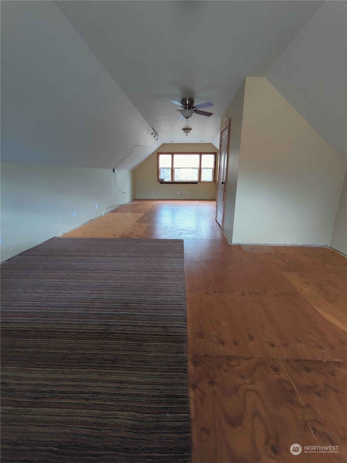 18142 Peter Burns Road Mount Vernon, WA 98274 - Photo 23 of 39 a view of a hallway with wooden floor