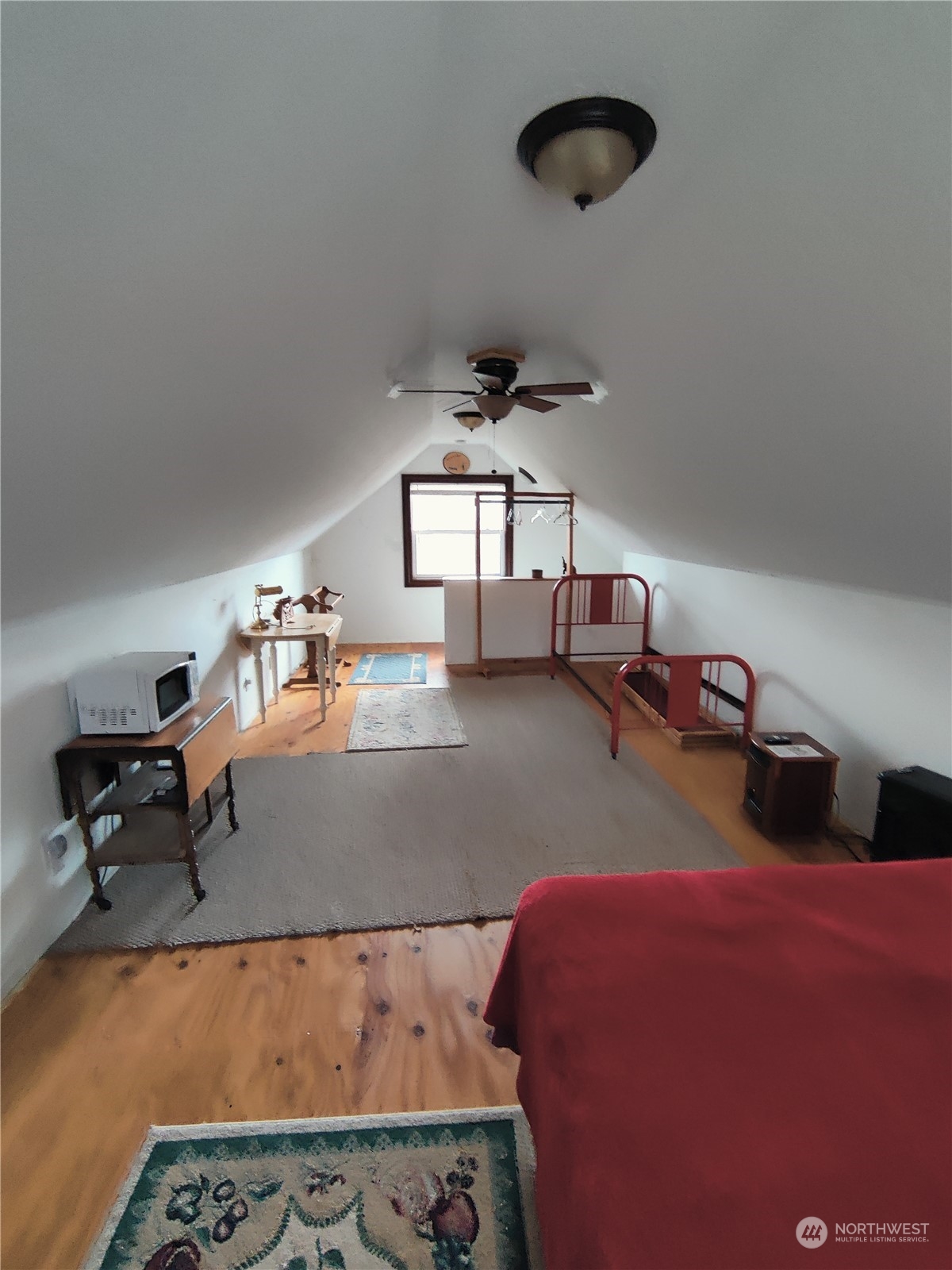 18142 Peter Burns Road Mount Vernon, WA 98274 - Photo 27 of 39 a bedroom with furniture and a window