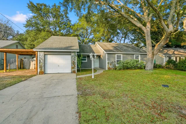 a house with trees in the background