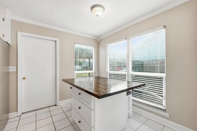 a kitchen with stainless steel appliances granite countertop a refrigerator sink and cabinets