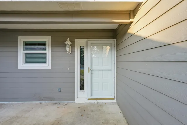 a view of a yard with trees