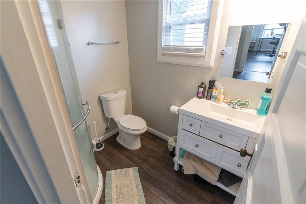 231 Maple Street Slippery Rock, PA 16057 - Photo 15 of 22 a bathroom with a sink and a mirror