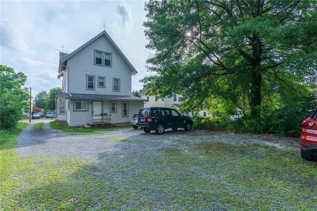231 Maple Street Slippery Rock, PA 16057 - Photo 22 of 22 a view of a house with a yard