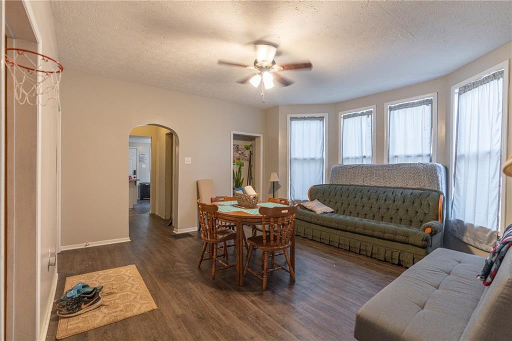 231 Maple Street Slippery Rock, PA 16057 - Photo 4 of 22 a living room with furniture and wooden floor