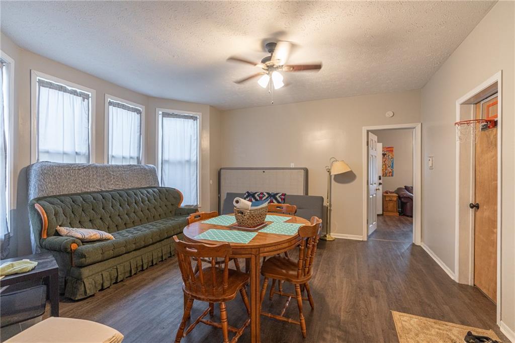 231 Maple Street Slippery Rock, PA 16057 - Photo 5 of 22 a living room with furniture and wooden floor