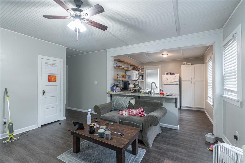 231 Maple Street Slippery Rock, PA 16057 - Photo 10 of 22 a living room with furniture and a wooden floor