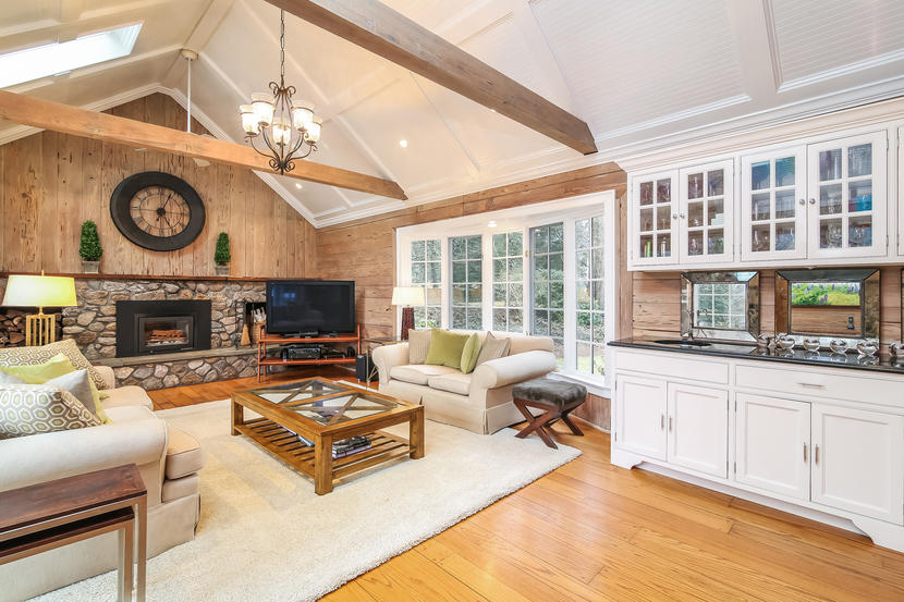 74 Stanton Road Darien, CT 06820 - Photo 14 of 52 a living room with furniture and a fireplace