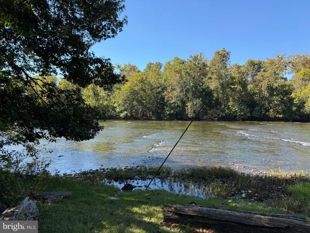 a view of a backyard of the house