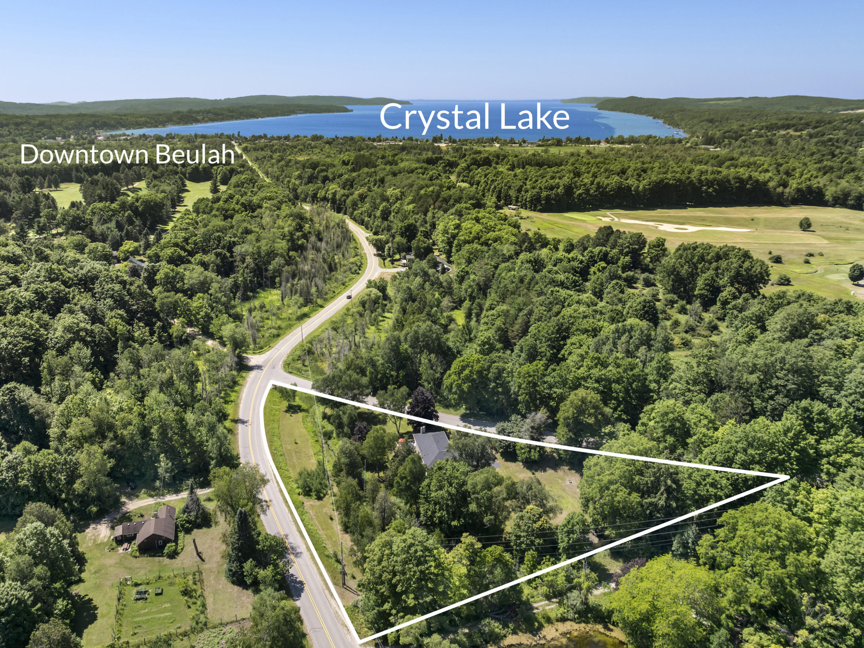 8468 Narrow Gauge Road Beulah, MI 49617 - Photo 2 of 39 DJI_20260714153637_0045_D