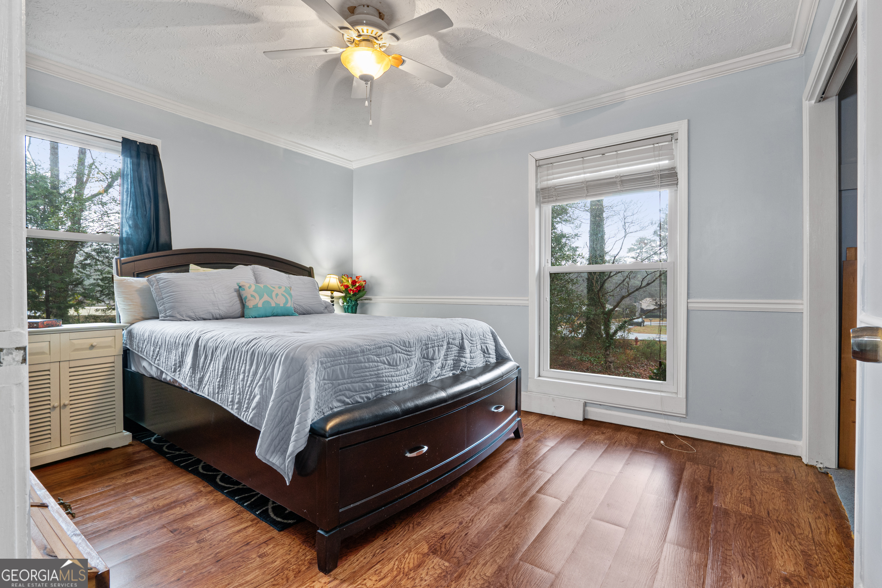861 Bonner Road Carrollton, GA 30117 - Photo 23 of 38 a bedroom with a bed lamp and window