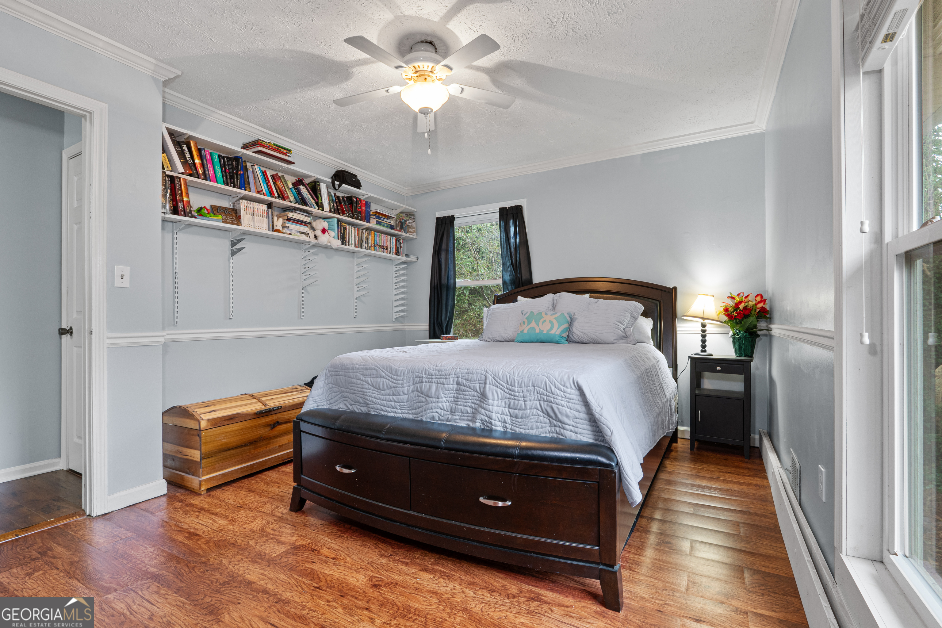 861 Bonner Road Carrollton, GA 30117 - Photo 24 of 38 a bedroom with a bed and a book shelf