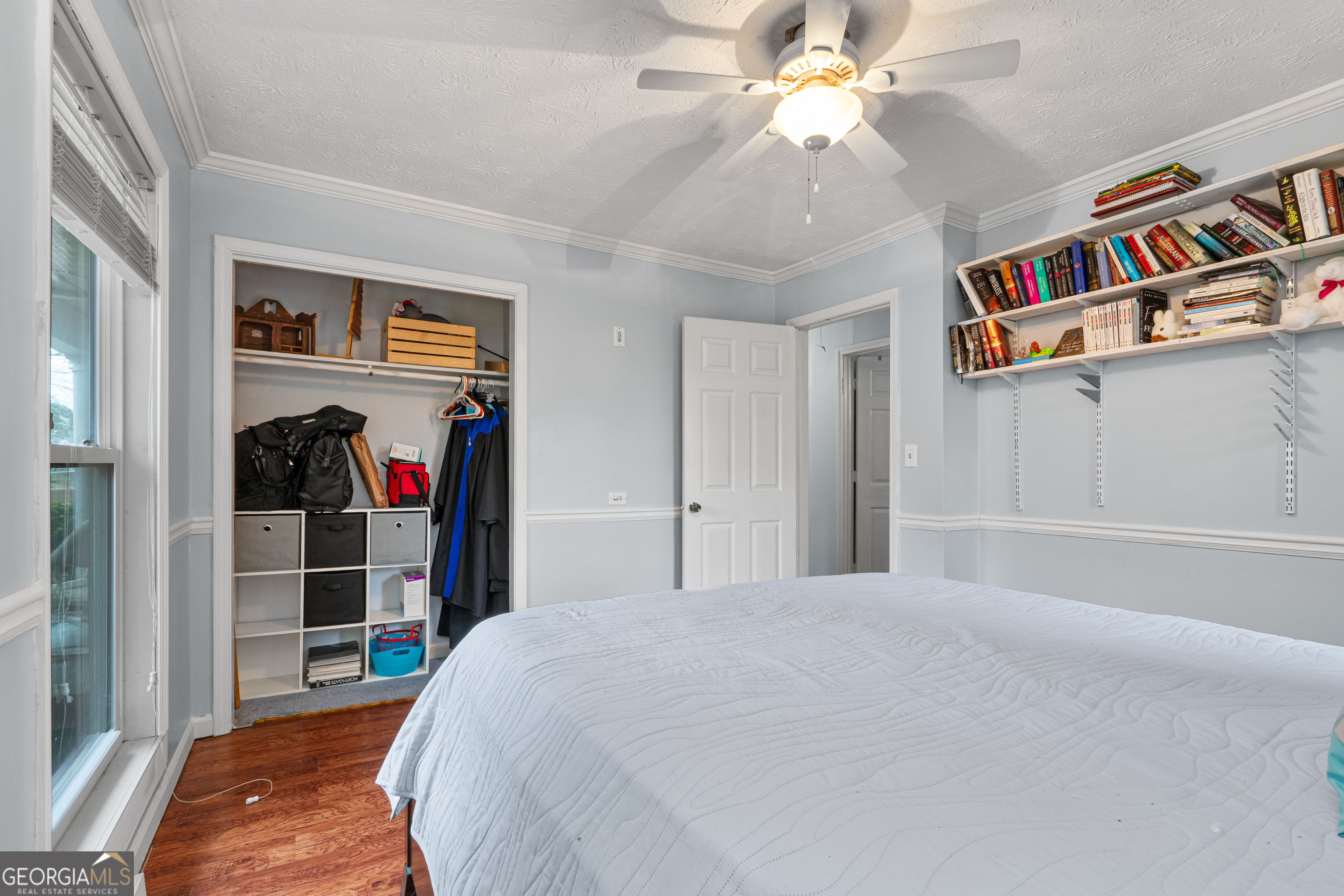 861 Bonner Road Carrollton, GA 30117 - Photo 25 of 38 a bedroom with a bed and a book shelf