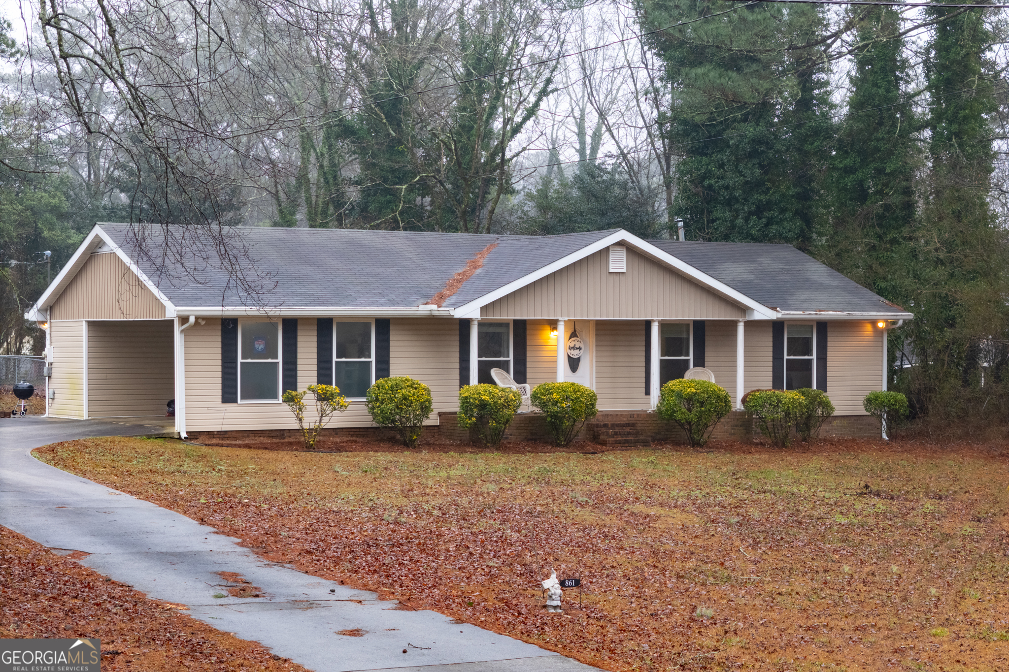 861 Bonner Road Carrollton, GA 30117 - Photo 30 of 38 a front view of a house with garden