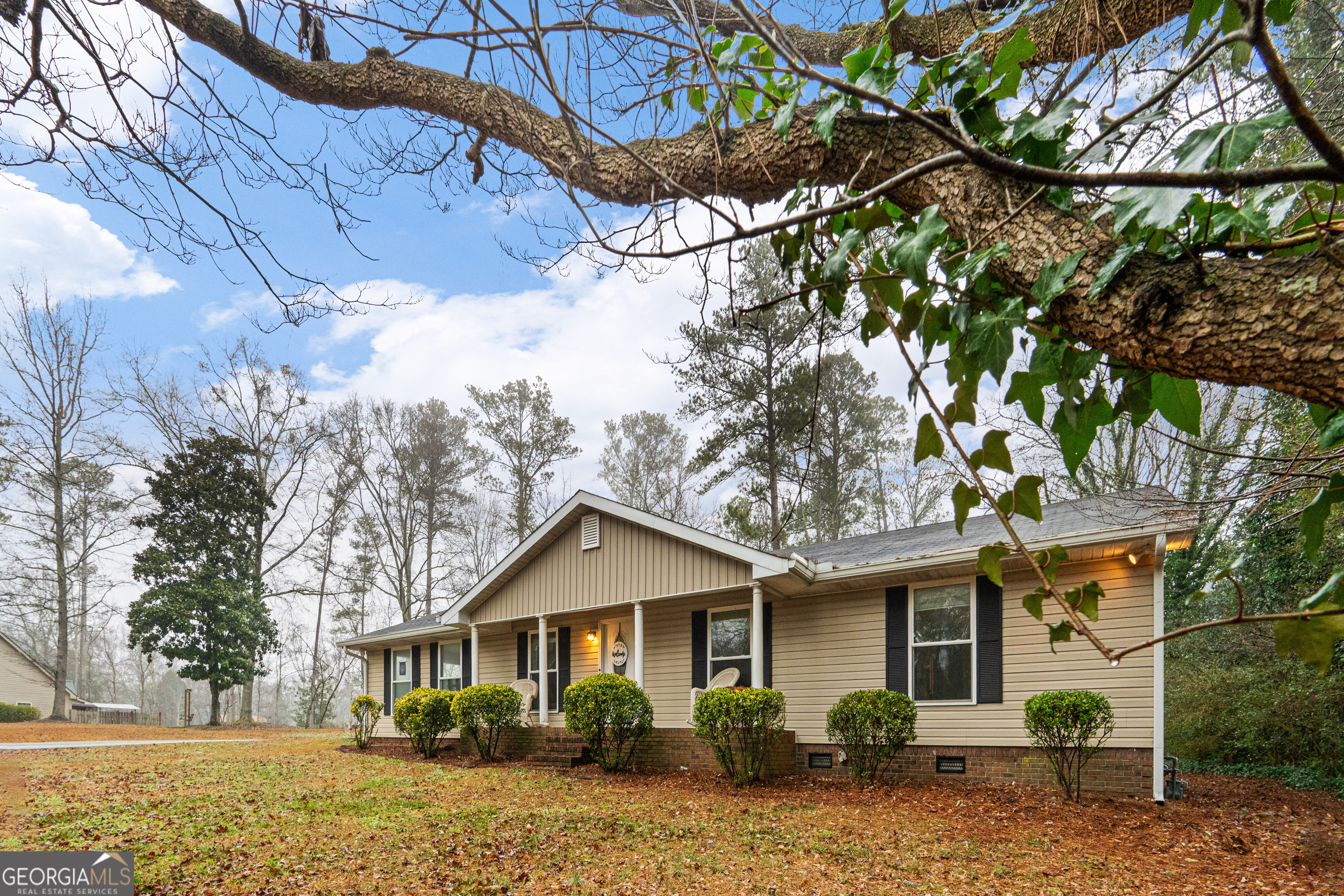 861 Bonner Road Carrollton, GA 30117 - Photo 34 of 38 a front view of a house with a yard
