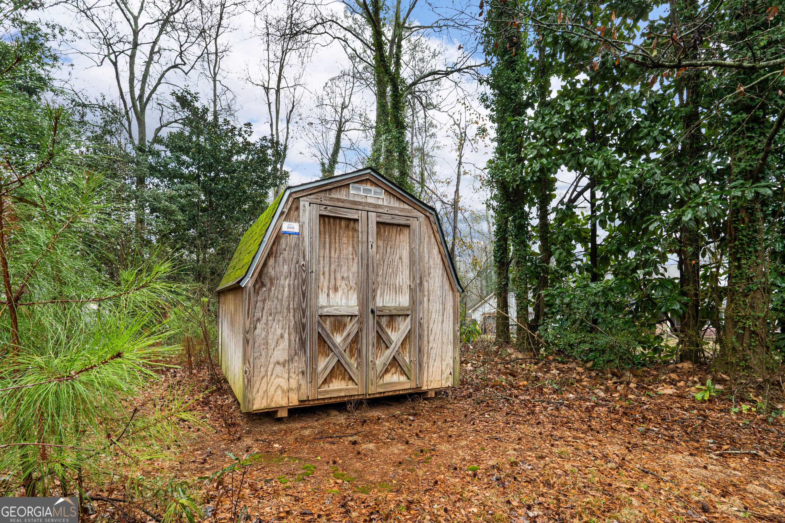 861 Bonner Road Carrollton, GA 30117 - Photo 35 of 38 a view of outdoor space with a garden and entertaining space