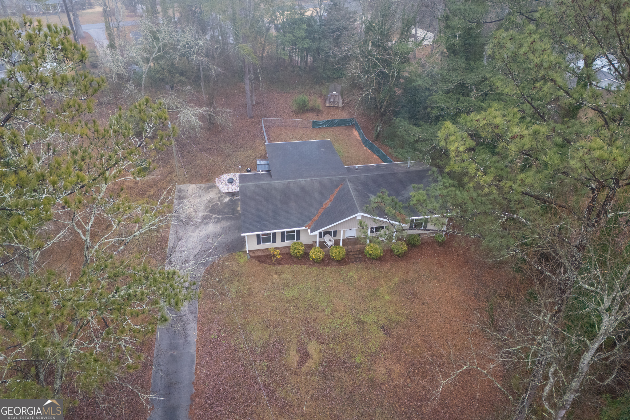 861 Bonner Road Carrollton, GA 30117 - Photo 36 of 38 an aerial view of a house with a yard and large tree