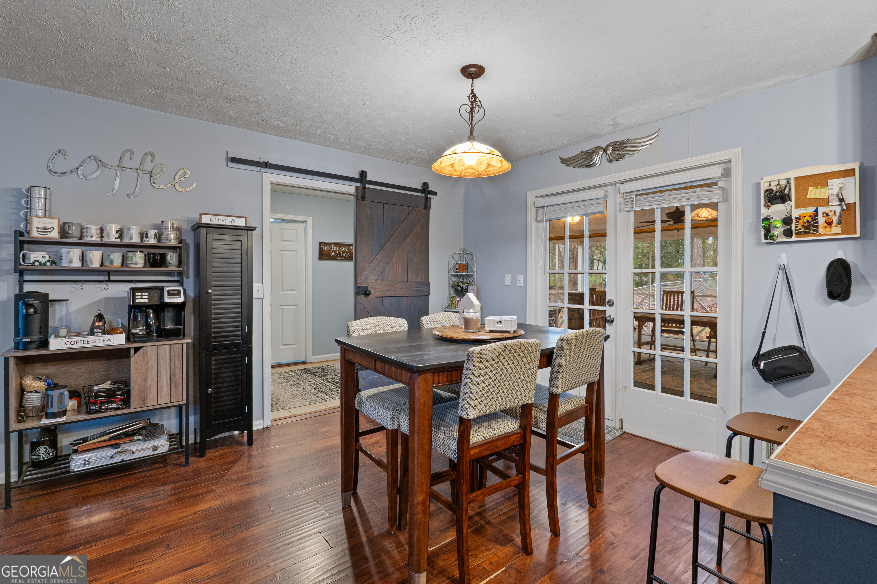 861 Bonner Road Carrollton, GA 30117 - Photo 6 of 38 a view of a dining room with furniture window and wooden floor