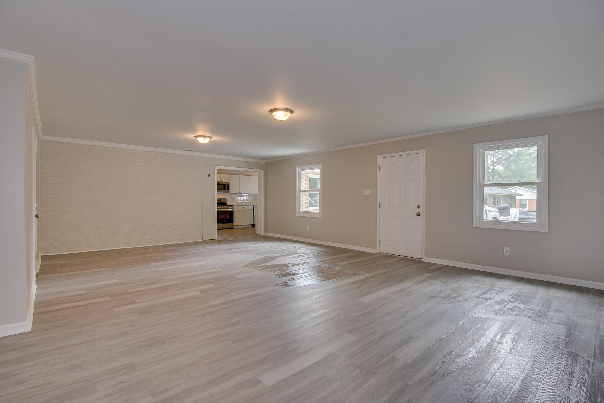 2115 Ashley Drive Augusta, GA 30906 - Photo 21 of 38 a view of empty room with wooden floor and window