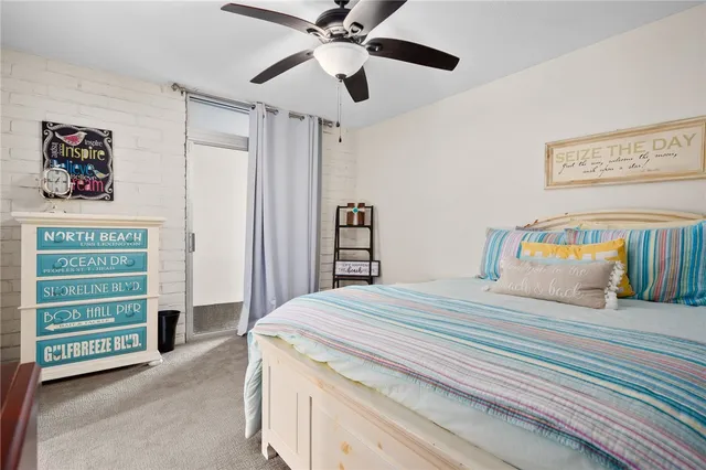 a bedroom with a bed and a cabinets