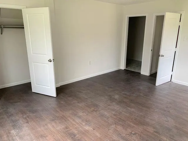 an empty room with a hallway