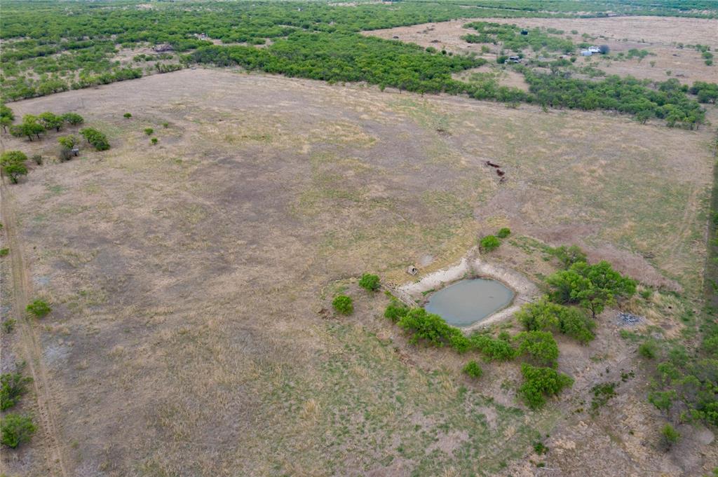 6 Albany Tx 76424 Breckenridge, TX 76424 - Photo 18 of 35 a backyard of a house with lots of green space